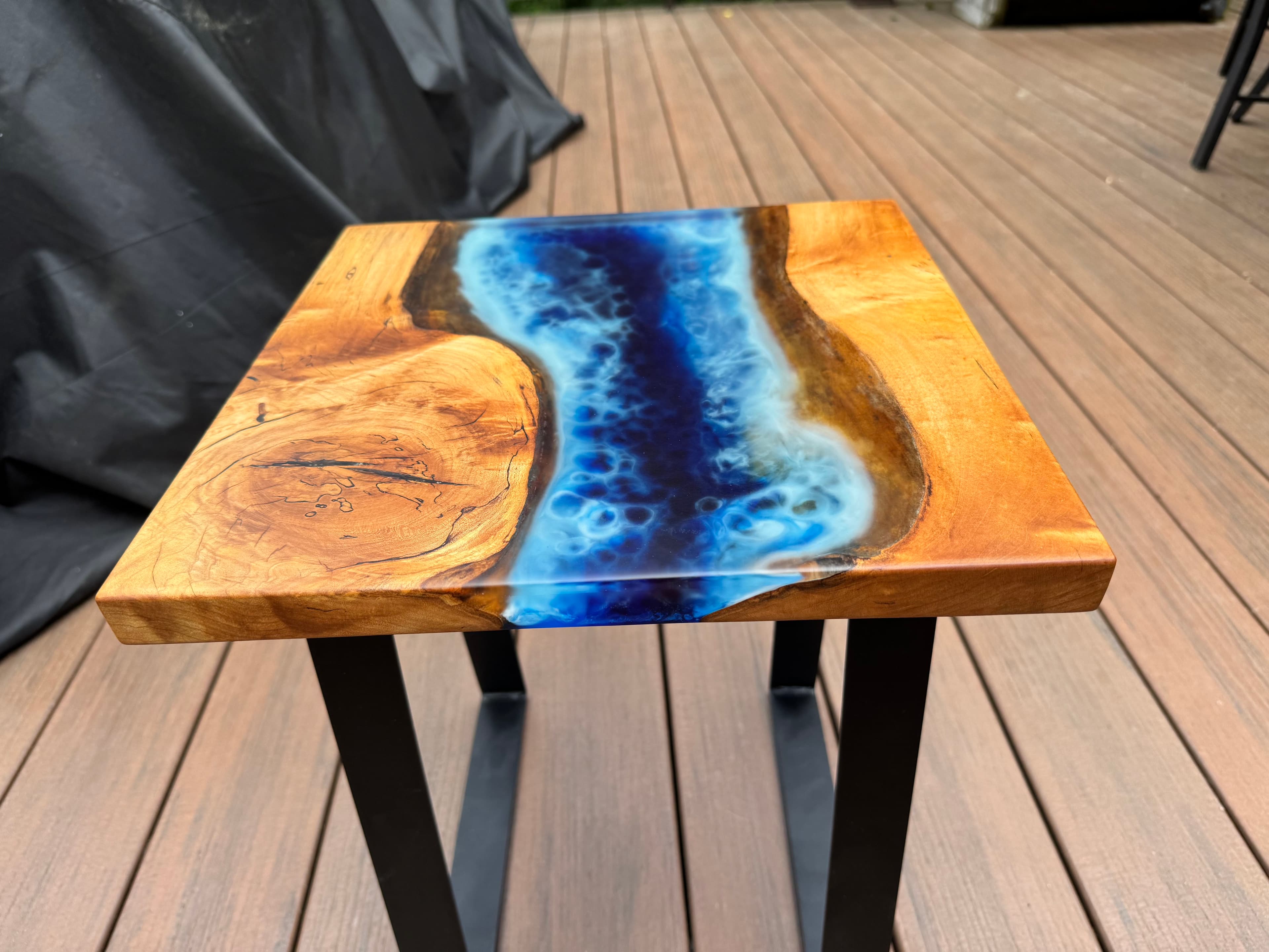 Ocean End Table — Ocean themed epoxy resin end table with blue tinted resin waves and a live edge wood shoreline. (photo 1 of 10)